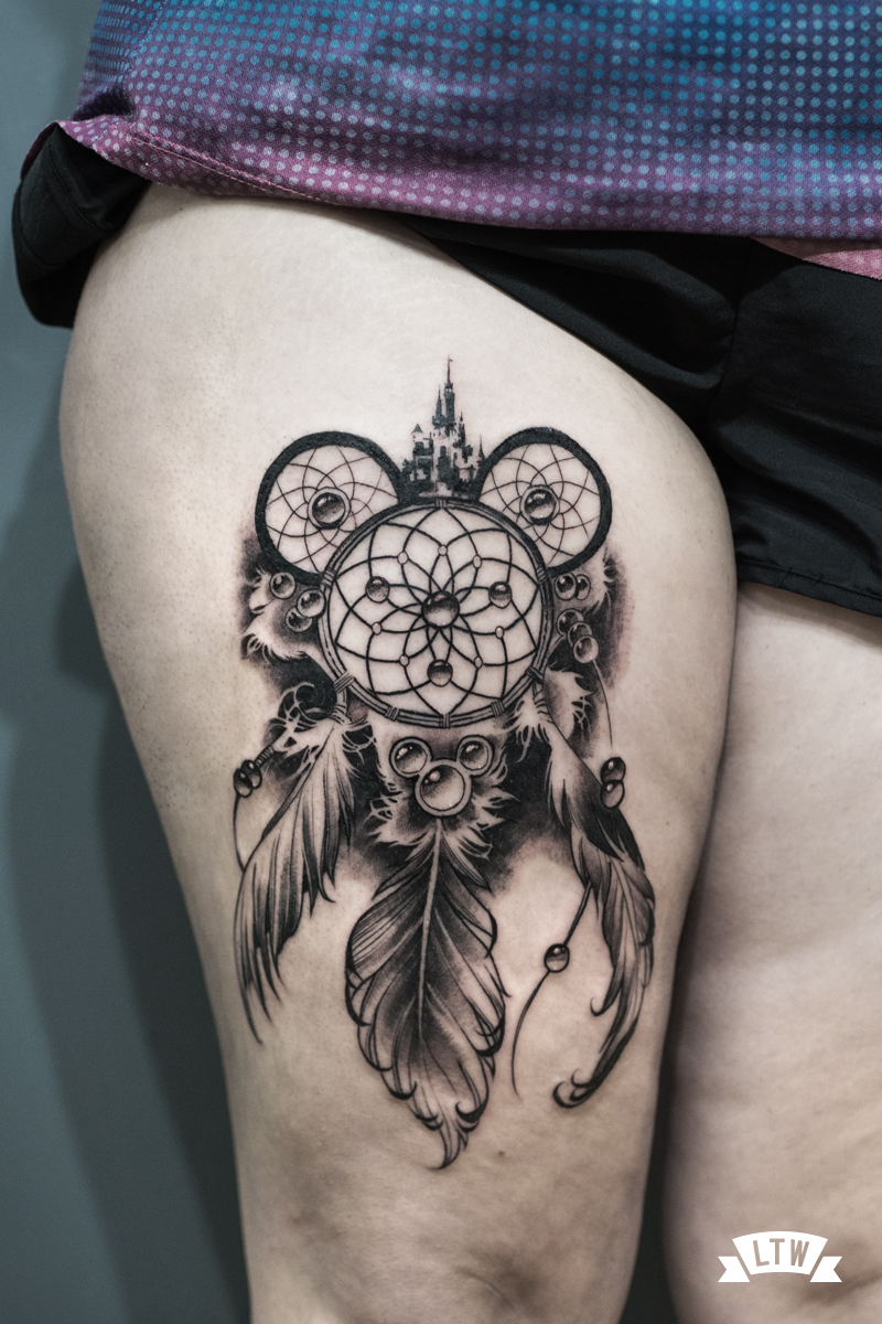 Dream catcher tattooed in black and grey by Man