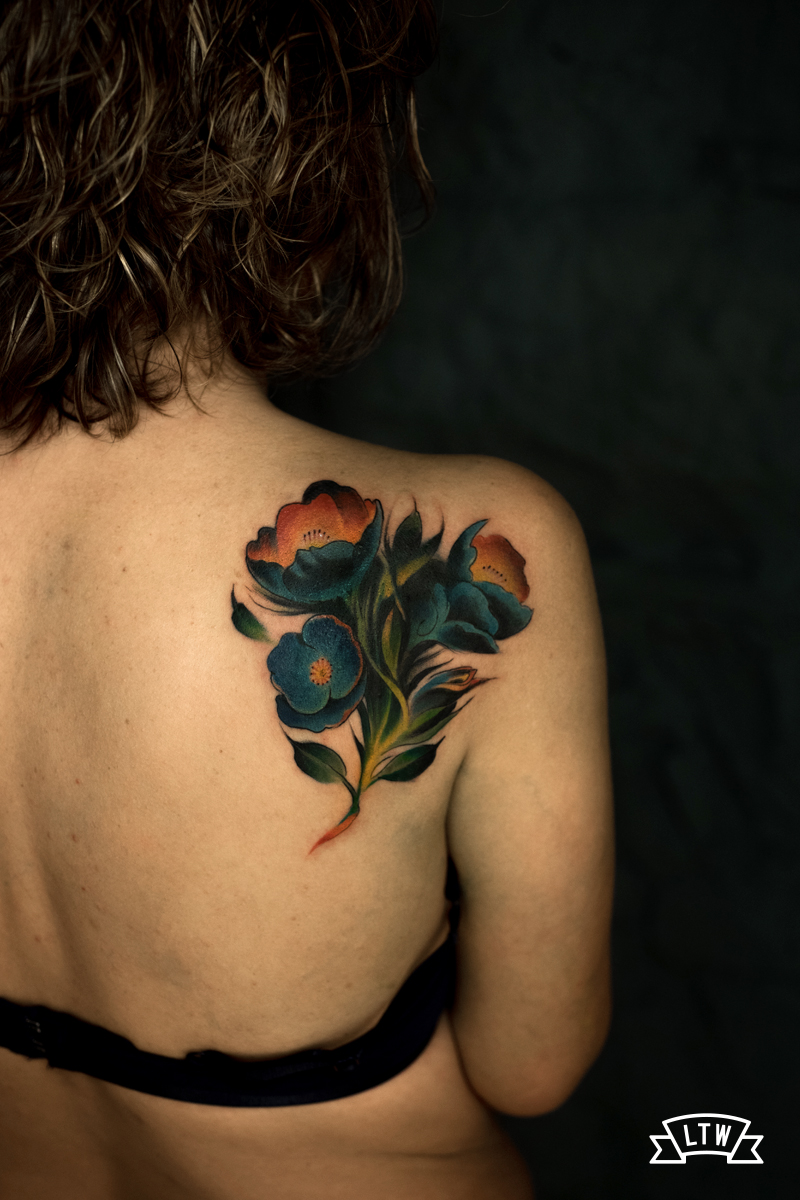 Flors tatuades a color pel Man