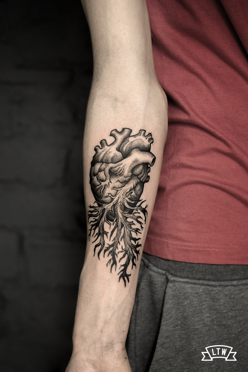 Anatomical heart with roots tattooed by Rafa Serrano