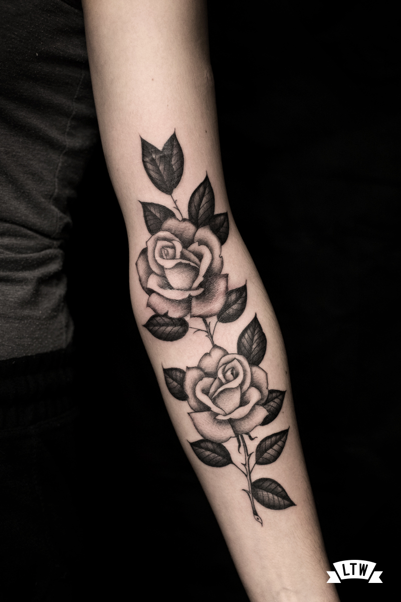 Roses tattooed by Alexis in black and grey