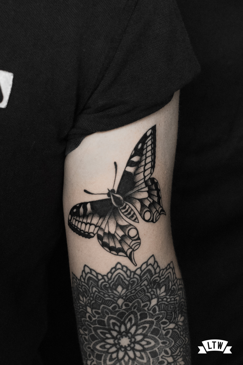 Mariposa tatuada por Alexis