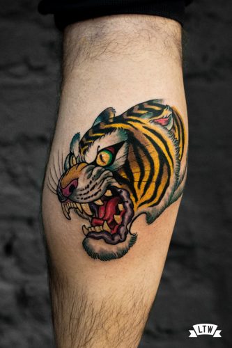 Colored tiger tattooed by Rafa Serrano