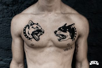 Black and white tattooed dogs by Ese Black