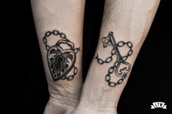 Black and white key and padlock tattooed by Enol