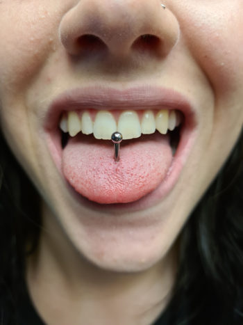 Classic tongue piercing