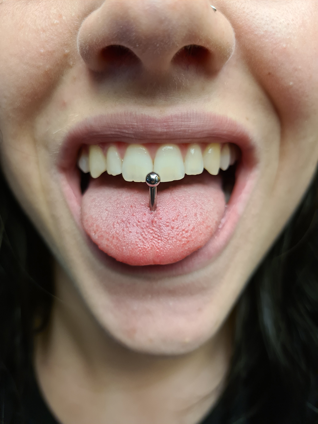 Classic tongue piercing